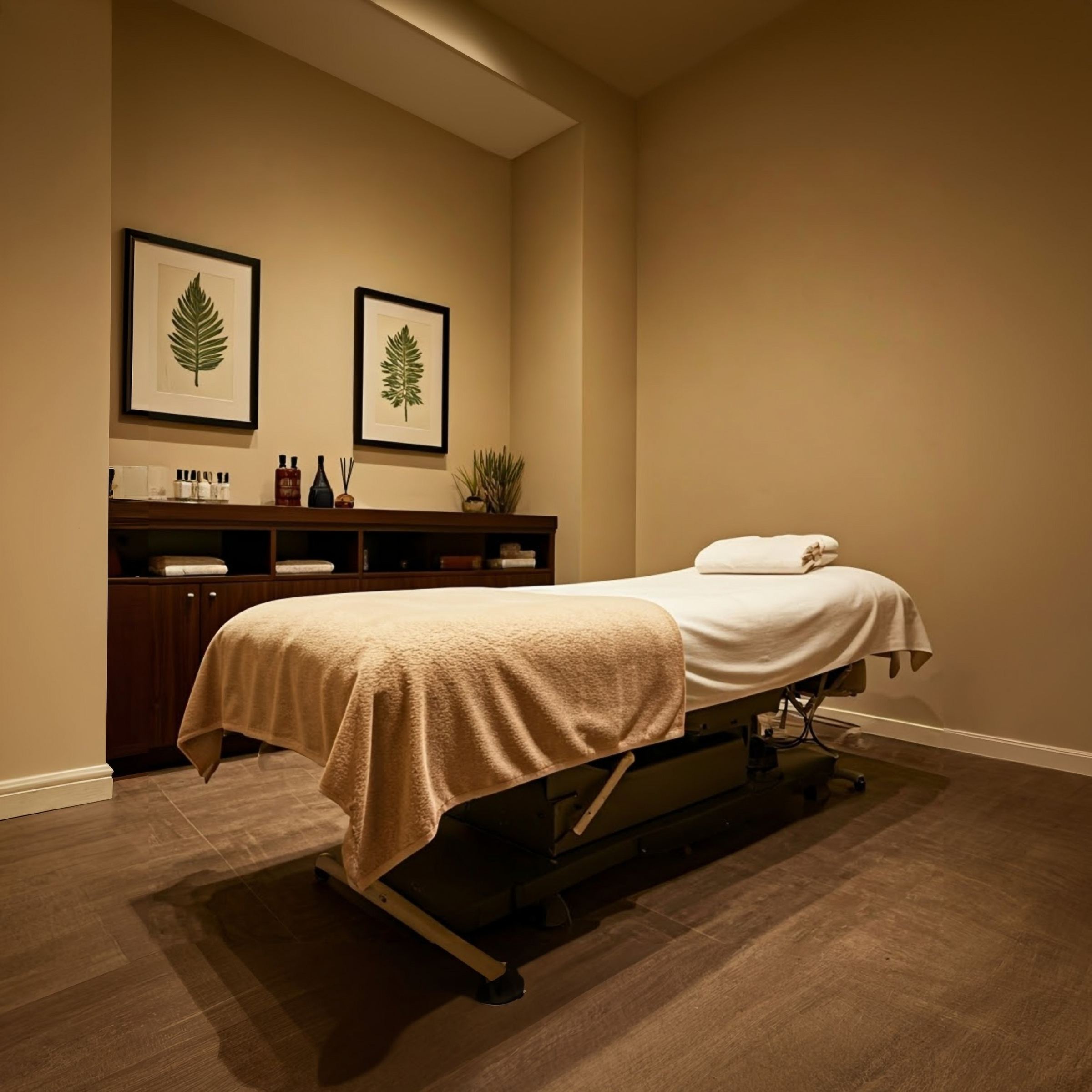 A calm, softly lit private treatment room